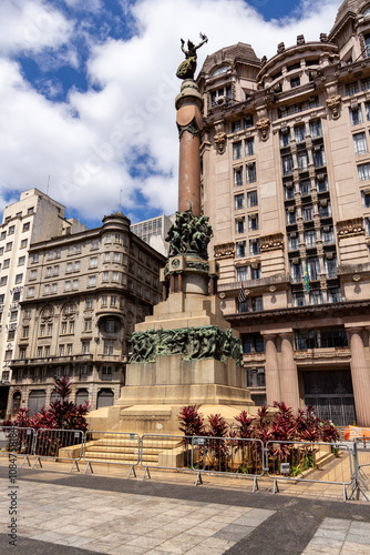 SÃO PAULO, SP, BRAZIL - OCTOBER 13, 2024: Pateo do Collegio Square, with the Immortal Glory to the Founders of São Paulo monument and the State Court of Justice building in the background.