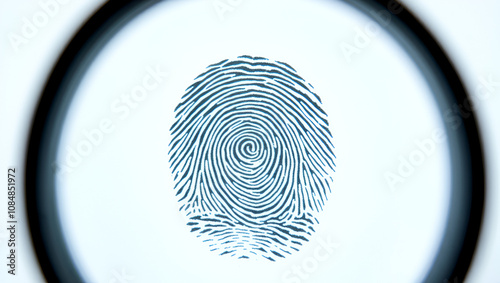 A highly magnified fingerprint on a white background is examined with a classic magnifying glass, revealing intricate details and whorls of an individual's unique print.