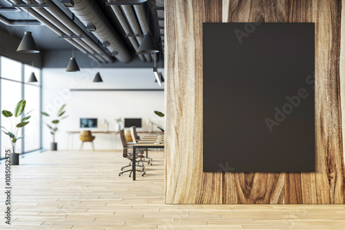 Modern office interior with wooden walls, empty dark canvas, desks in background, and large windows with city view. 3D Rendering