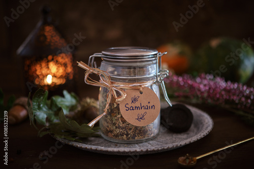 Incense mixture for Samhain in a jar (frankincense, copal, myrrh, cedarwood, rosemary). Samhain is a celtic seasonal festival marking the beginning of winter.