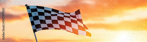 Dynamic checkered flag blowing in the wind, set against a radiant sunset backdrop, celebrating success and perseverance