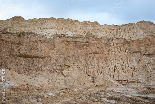 Sand quarry wall. View from below onto the excavated slope