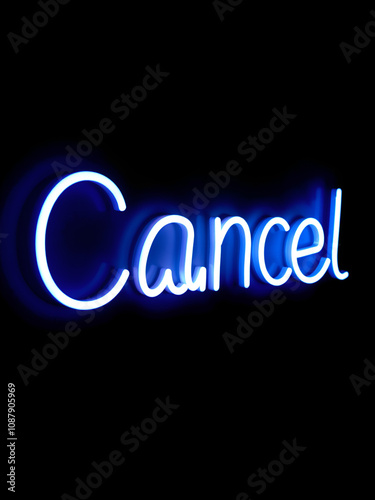 The Word 'Cancel' in Glowing Blue Light on a Dark Background