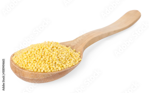 Millet groats in wooden spoon isolated on white