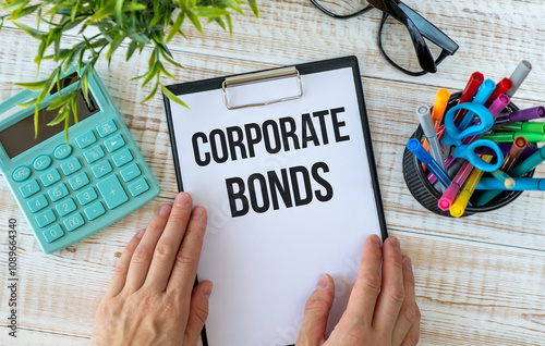 CORPORATE BONDS text on clipboard on wooden background