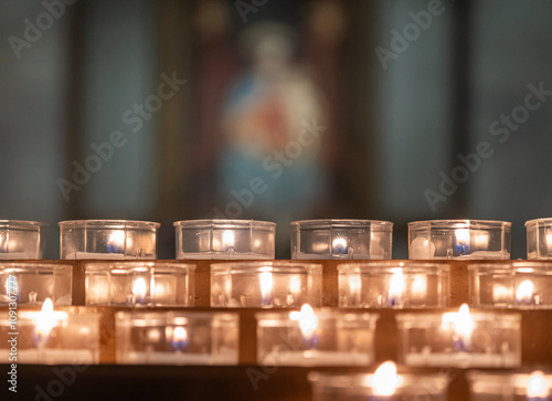 lit candles in church during prayer