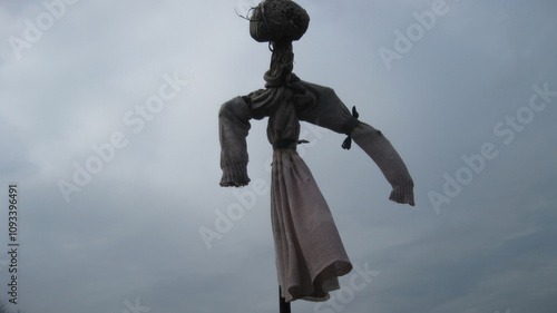 The scarecrow in the autumn field