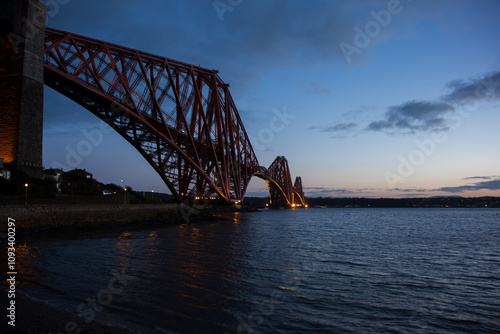 Forth Rail Bridge at sunset over Firth of Forth near Queensferry in Scotland