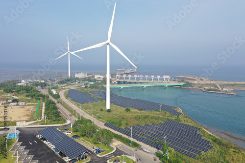 Landscape with wind turbine and sea view 