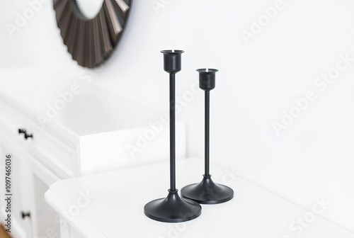 Black Metal Candle Holders A pair of slim black metal candle hol