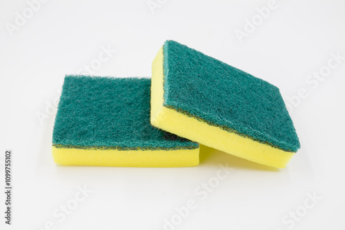 Yellow sponge, Cleaning concept, Yellow sponge for dishwashing in kitchen on white background.