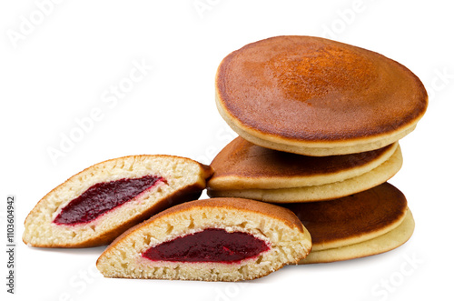 Pancakes with jam filling on a white background. Isolated