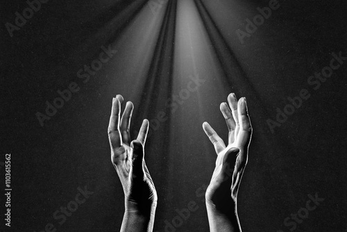 Hand Praying Reaching Light in Black and White on Textured Paper Background, Copy Space