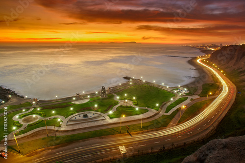 La Costa Verde under the night sky.The city lights dance along the coast, waves softened into mist with the long exposure, creating a dreamscape that feels otherworldly. Miraflores Lima Peru