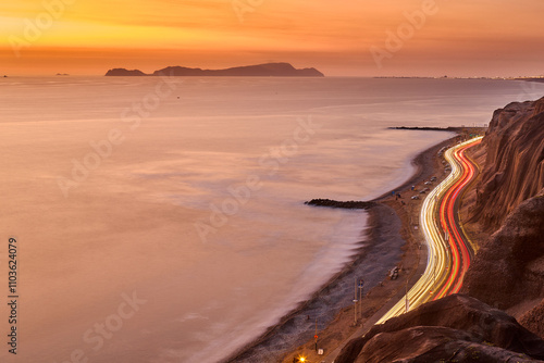 La Costa Verde under the night sky.The city lights dance along the coast, waves softened into mist with the long exposure, creating a dreamscape that feels otherworldly. Miraflores Lima Peru