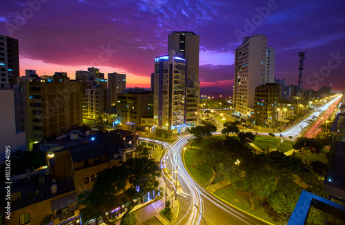 La Costa Verde under the night sky.The city lights dance along the coast, waves softened into mist with the long exposure, creating a dreamscape that feels otherworldly. Miraflores Lima Peru