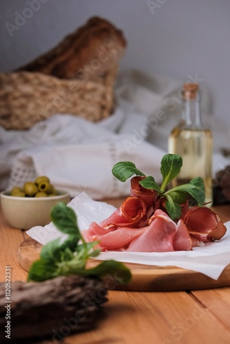 Prosciutto. Meat appetizer on the table. Italian appetizer for the table. Wine appetizer.