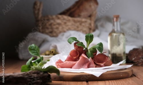 Prosciutto. Meat appetizer on the table. Italian appetizer for the table. Wine appetizer.