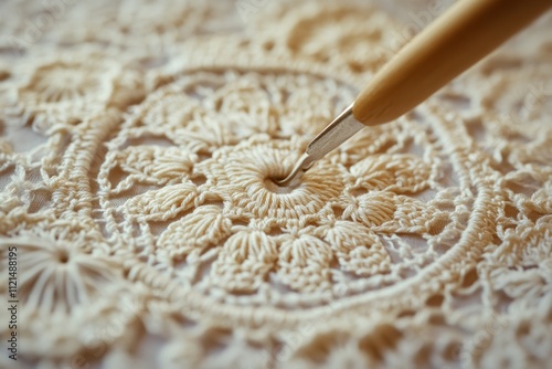 A crochet needle pierces delicate lace, creating intricate patterns with meticulous craftsmanship and timeless tradition.