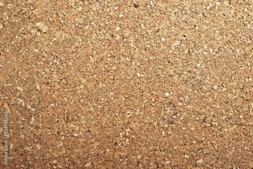 Natural cork texture with a uniform, granulated appearance suitable for various applications