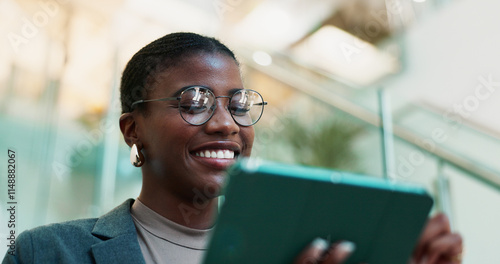 Office, black woman and smile with tablet for connection, software update and confidence for career. Happy, female person and web designer with digital for app notification, design tools and review